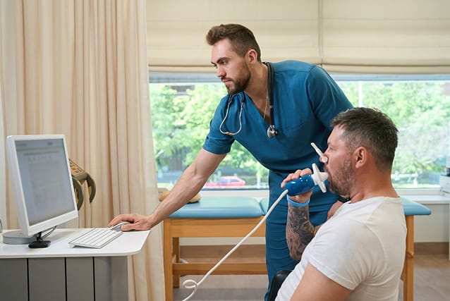 Patient undergoing spirometry test for asthma